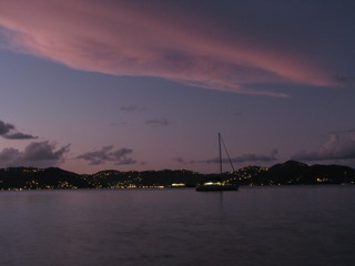 Our boat with Tortola at dusk