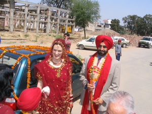 Bride and groom with their chariot