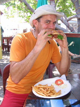 Kent savoring the Cheeseburger in Paradise